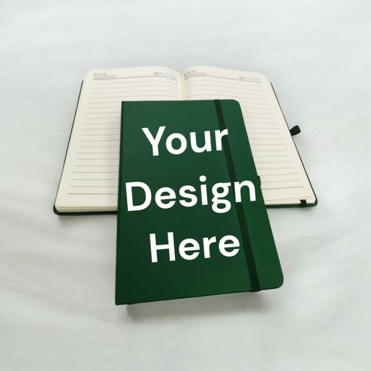 Multiple custom notebooks in various colors with corporate logos display Singapore