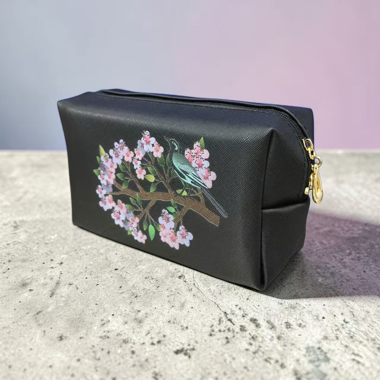 Custom pouch with cosmetics and accessories showing corporate branding at Singapore retail setting