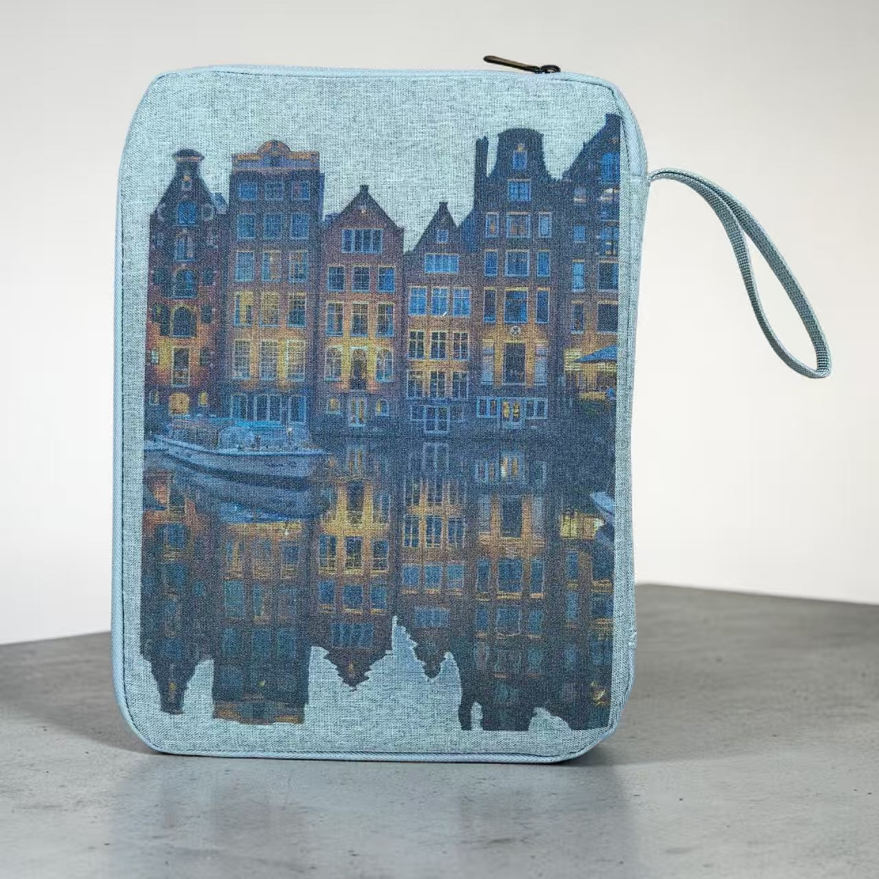 Multiple custom gadget cases in various colors with different corporate logos on display