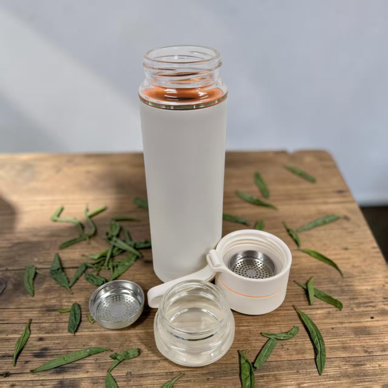 Premium double-wall glass tea infuser with stainless steel exterior custom printed with corporate branding in Singapore