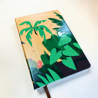 Professional customisation process for notebook printing at Singapore local production facility showing design application