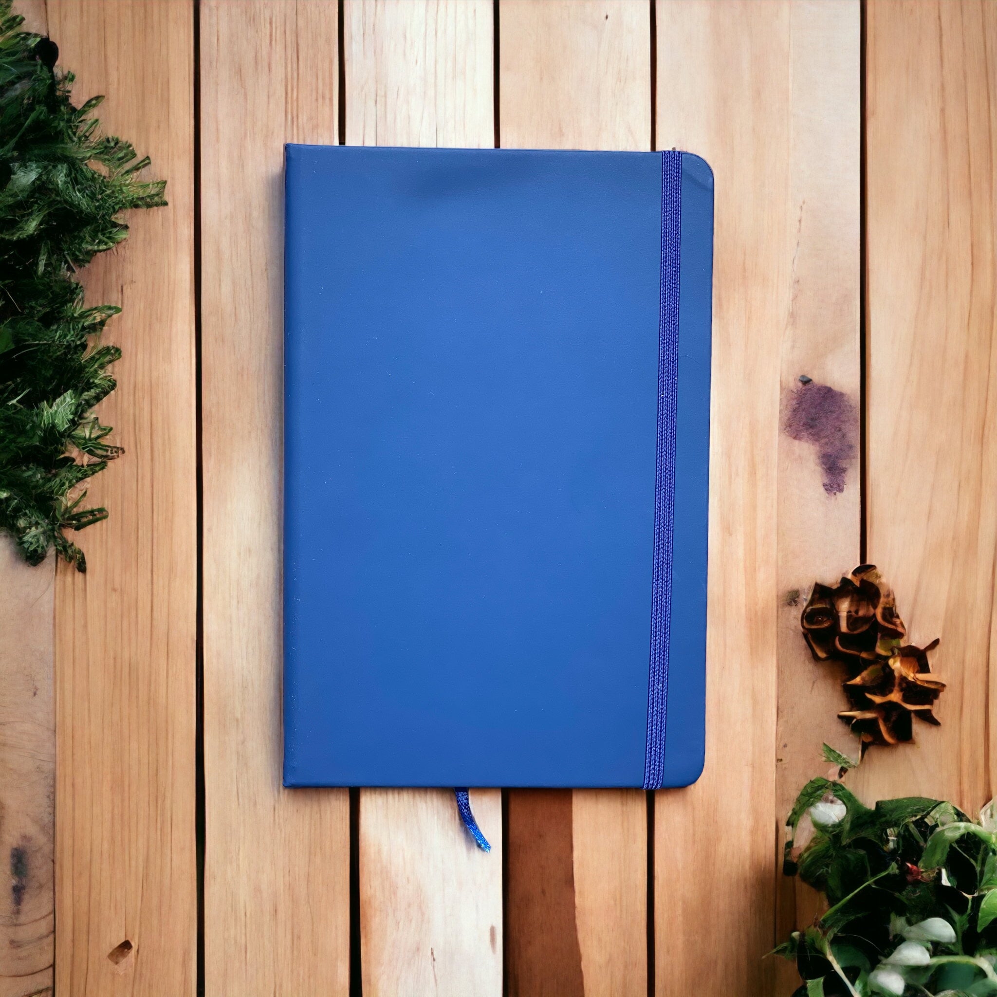 Personalised notebook in professional workspace showing corporate branding