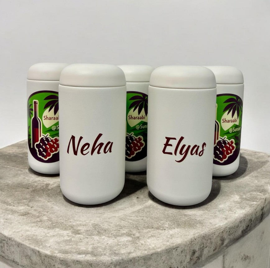 Custom tumbler with professional workspace showing corporate branding on desk