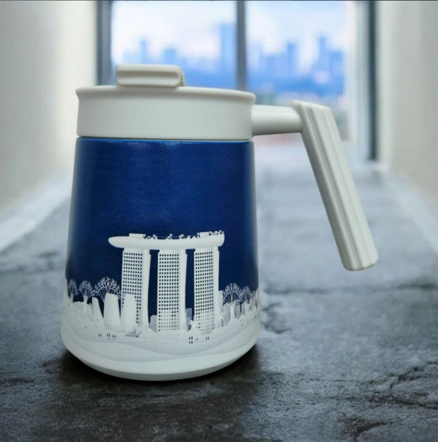 Custom tumbler with professional workspace showing corporate branding on office desk