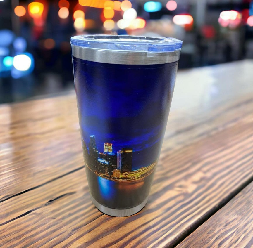 Custom coffee mug with professional workspace showing corporate branding on office desk