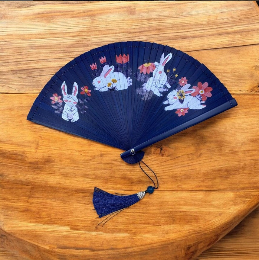 Bamboo Fan in Action During Singapore Outdoor Celebration