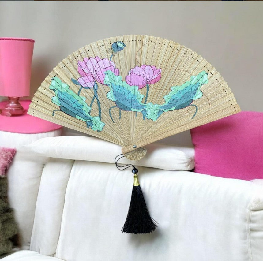 Personalised bamboo fan at outdoor corporate event showing branding Singapore