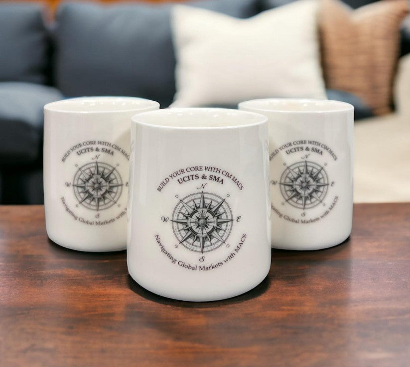 Custom ceramic mug with professional workspace showing corporate branding on office desk