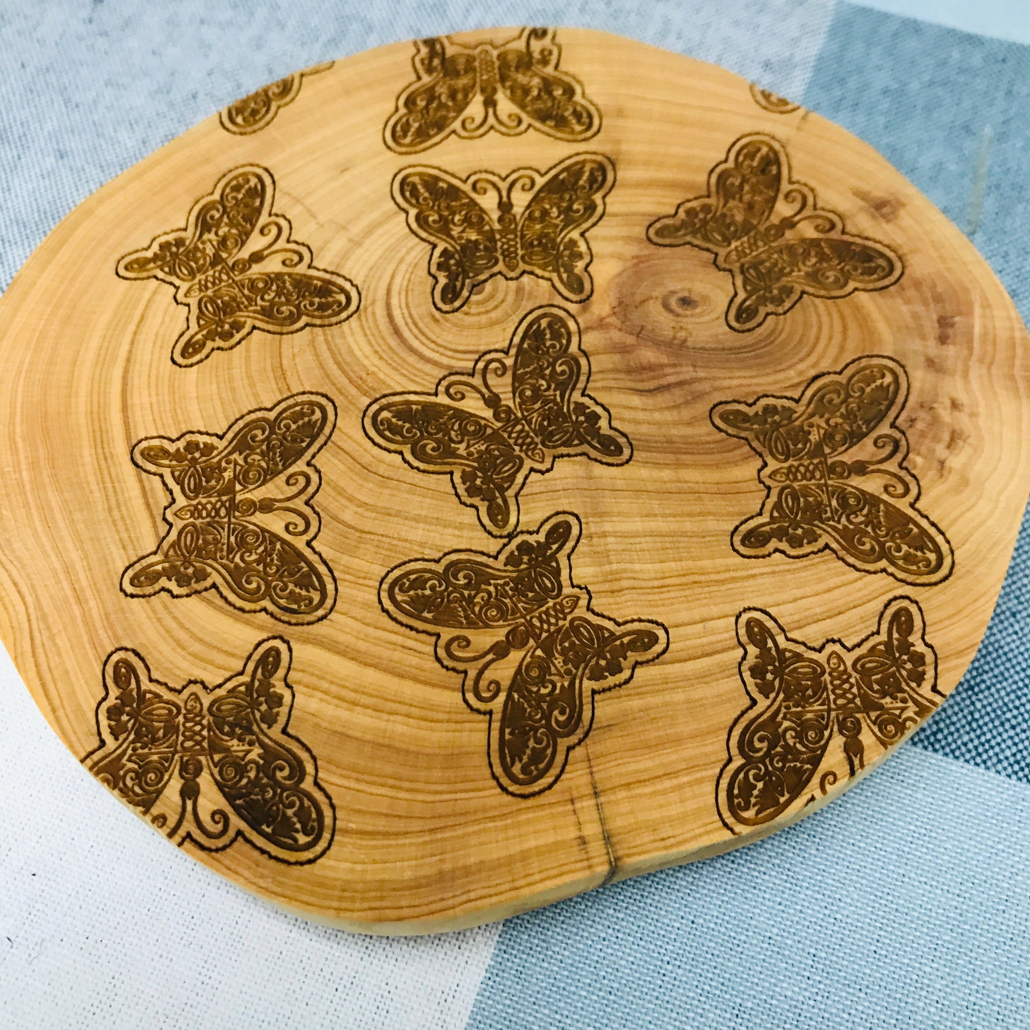 Close-up of High-Resolution UV Printing on Wooden Coasters – Singapore Quality