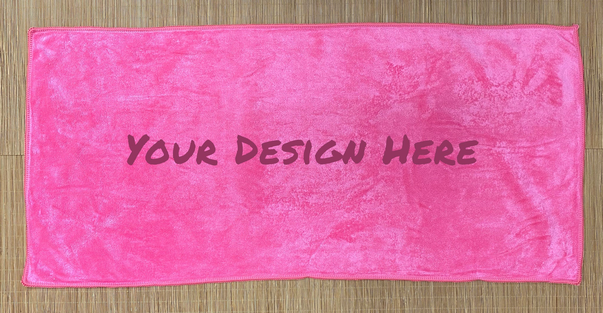 Laser engraving custom logo on premium cotton towel in Singapore printing facility