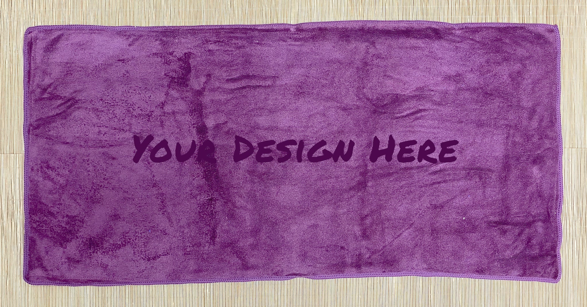 Close-up of precision towel engraving showing detailed custom branding
