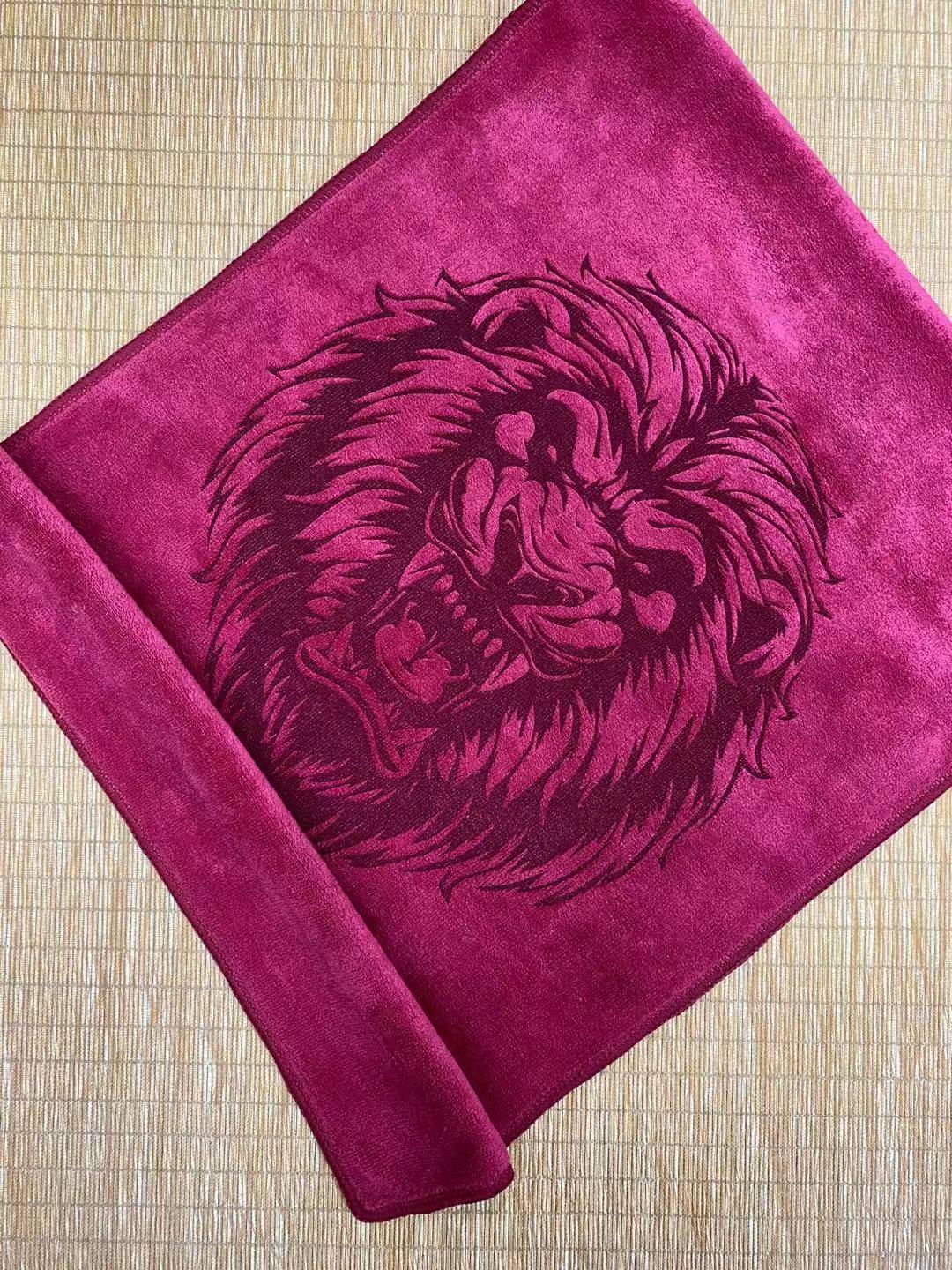 Laser engraving custom logo onto premium white bath towel