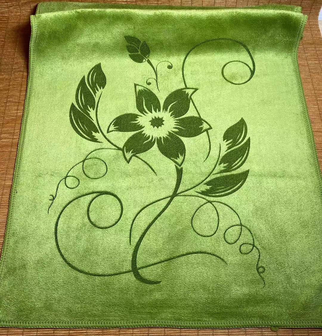 Neatly folded custom printed tea towels with company branding