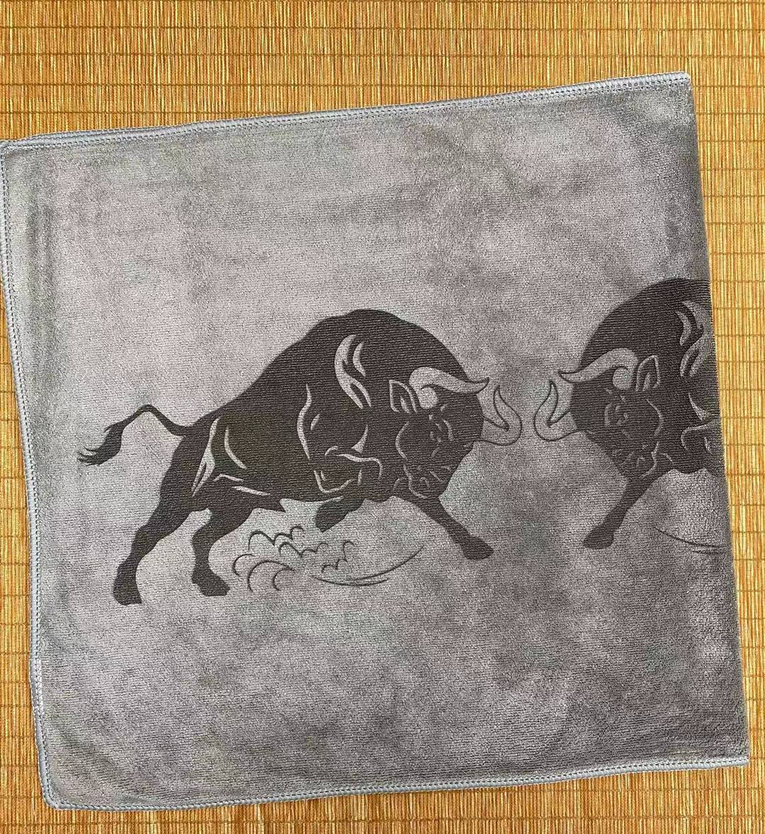 Range of custom printed corporate towels with various Singapore business logos