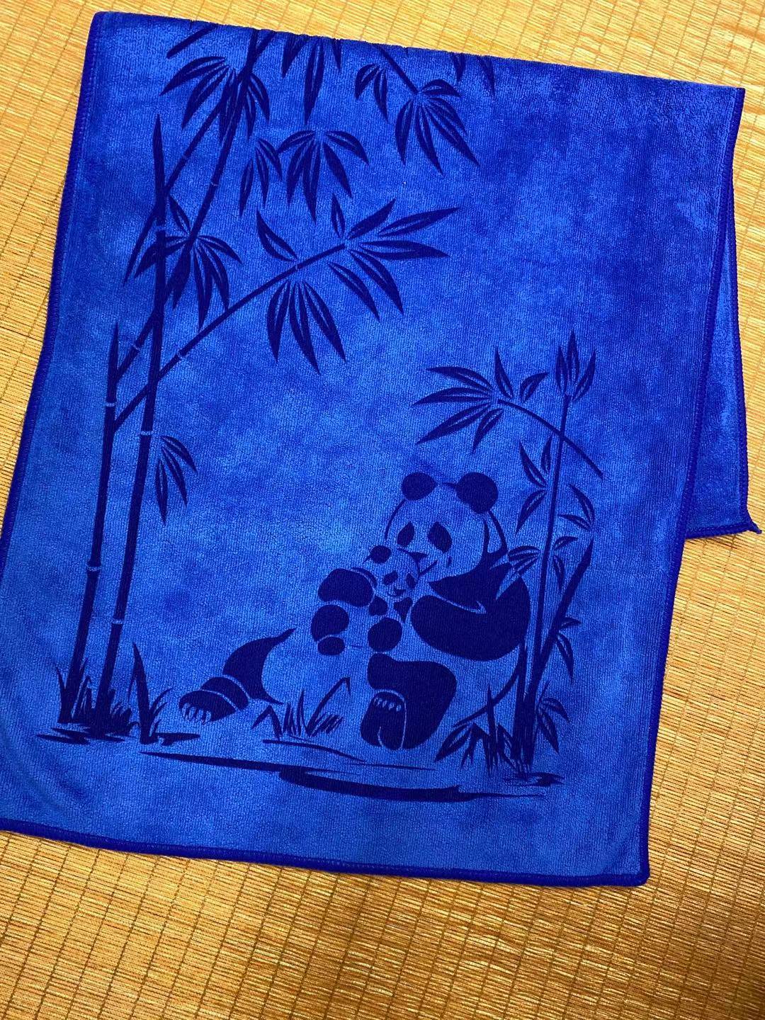 Close-up of precision towel engraving showing detailed custom branding