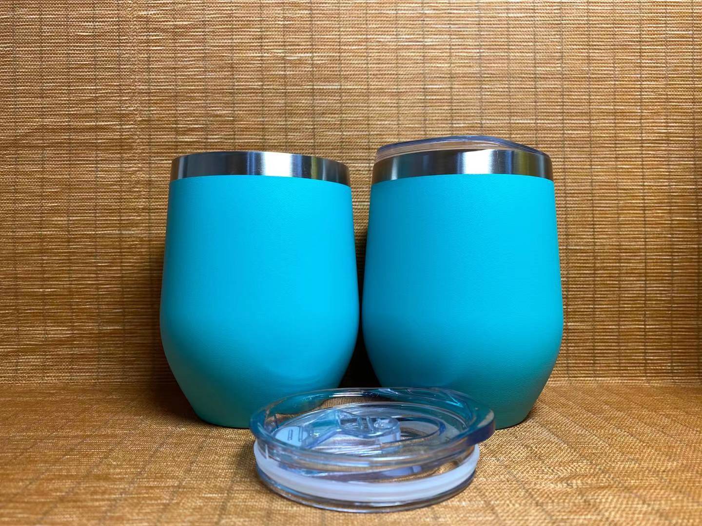 Custom tumbler with student backpack showing compact portable design for campus and office use