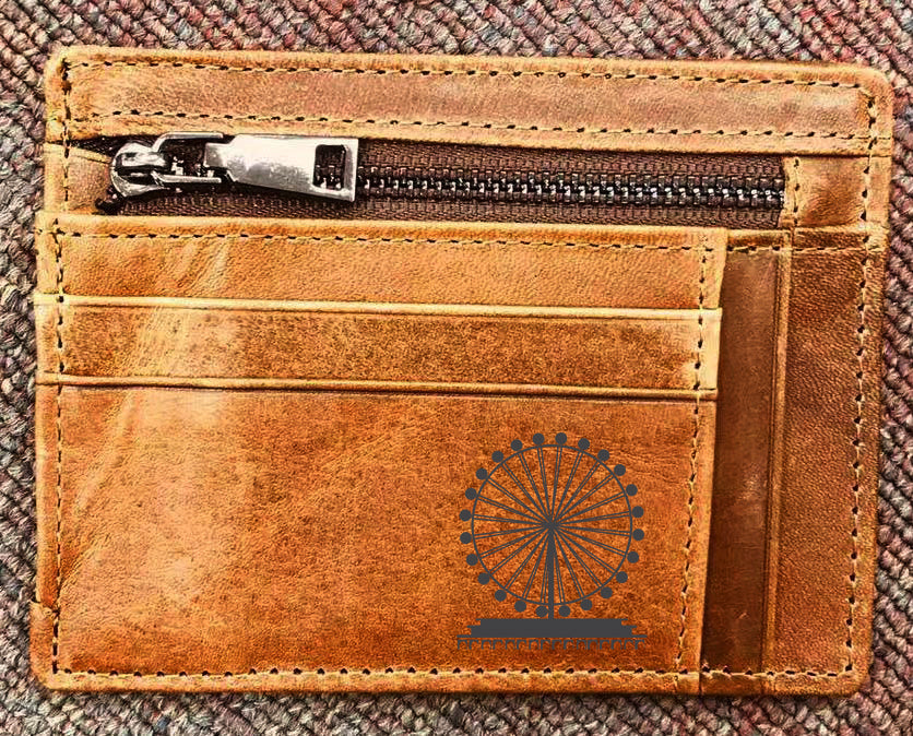 Custom printed genuine leather card holder featuring company logo debossed in silver on brown leather with elegant packaging