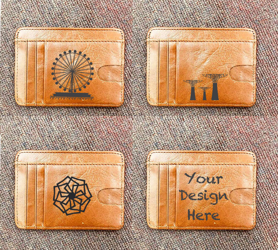 Custom printed genuine leather card holder featuring company logo debossed in gold on navy leather with elegant packaging