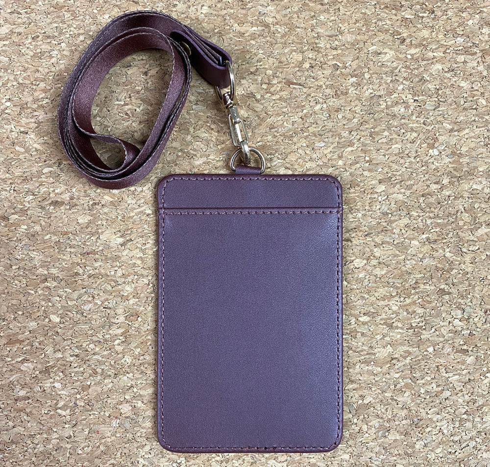 Custom printed card holder featuring company logo and 'Excellence in Every Detail' message with professional packaging